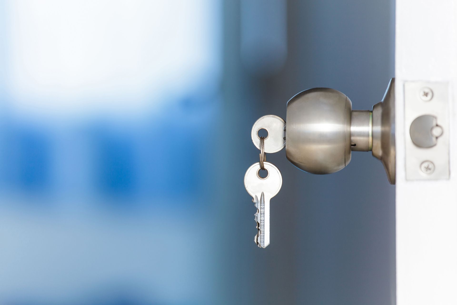 Key left hanging in a door knob lock, the kind of overnight lockout call Lock-Tech runs in Trenton, NJ